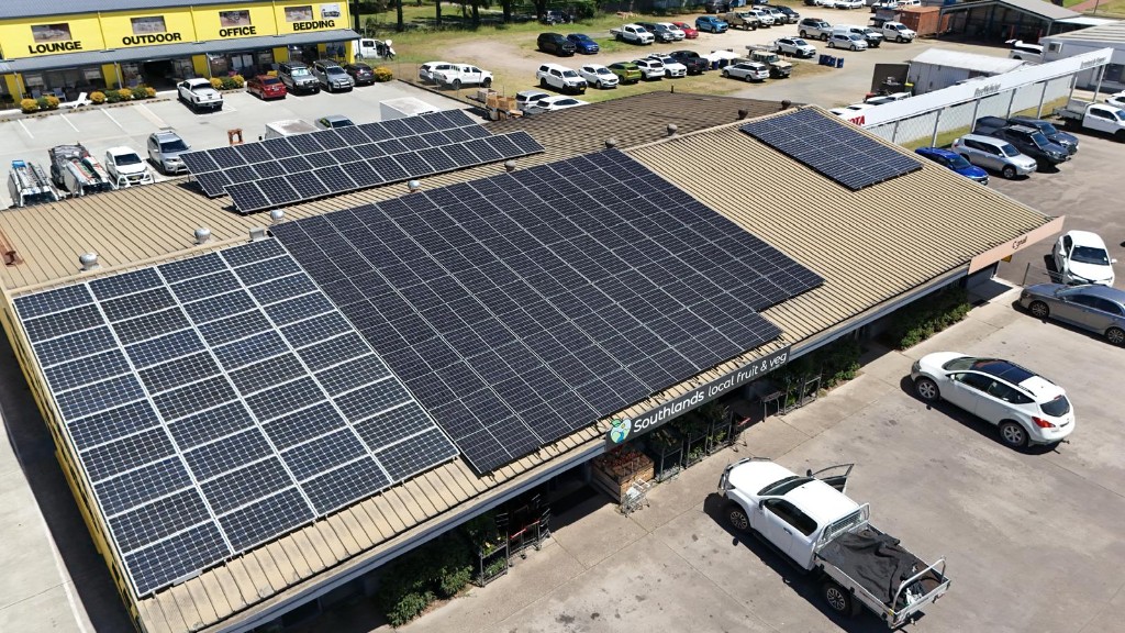 Aerial view of Southlands retail building with large rooftop solar installation